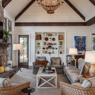 Inspiration for a coastal family room remodel in Atlanta with white walls, a stone fireplace, a standard fireplace and a wall-mounted tv