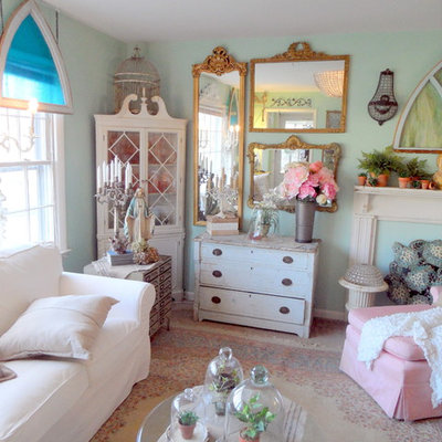 Family room - shabby-chic style enclosed family room idea in Richmond with blue walls