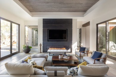 Example of a trendy open concept beige floor family room design in Sacramento with white walls, a ribbon fireplace and a media wall