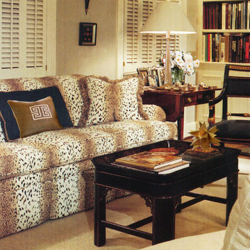 Luxurious cheetah print sofa in cozy library and home office