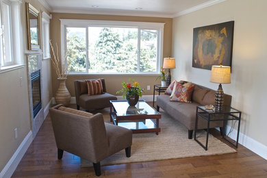 Example of a mid-sized trendy open concept dark wood floor and brown floor family room design in San Francisco with beige walls, a standard fireplace, a tile fireplace and no tv