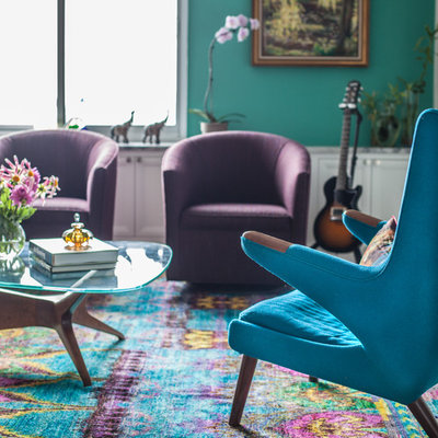 Family room - contemporary family room idea in New York with blue walls