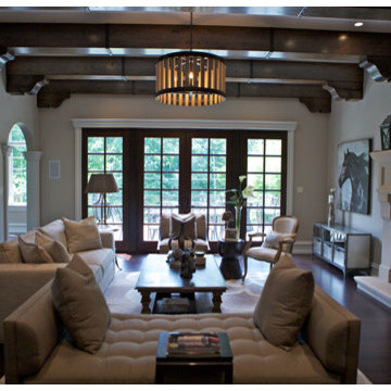 Main Line Rustic Family Room with Ceiling Beams