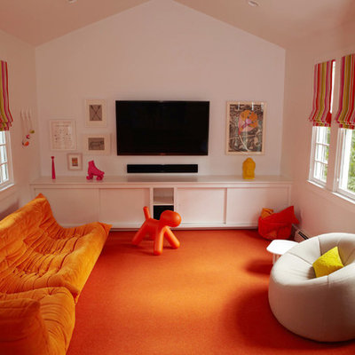 Mid-sized minimalist enclosed carpeted and orange floor family room photo in New York with white walls, no fireplace and a wall-mounted tv