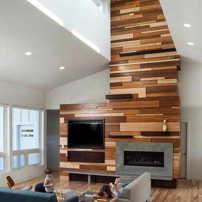 Family room - contemporary open concept medium tone wood floor family room idea in Omaha with white walls, a ribbon fireplace and a wall-mounted tv