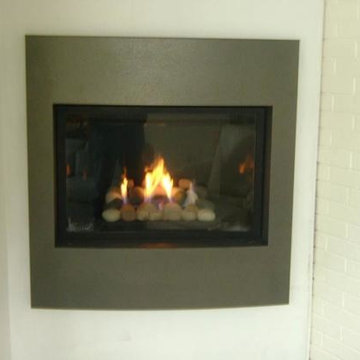 Marquis Collection by Kingsman. A Solara Direct Vent Gas Fireplace with a Pewter
