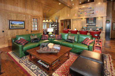 Inspiration for a rustic open concept medium tone wood floor and brown floor family room remodel in Phoenix