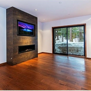 Master Bedroom with Standing Fireplace and Television