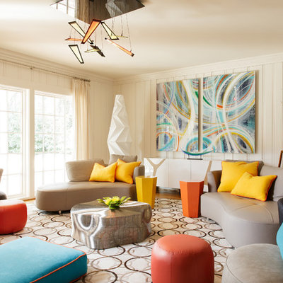 Inspiration for a mid-sized transitional enclosed medium tone wood floor and beige floor game room remodel in Dallas with white walls, a wall-mounted tv, a two-sided fireplace and a metal fireplace