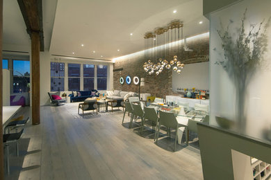 Family room - large contemporary loft-style family room idea in New York