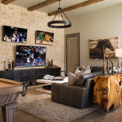 Mountain style dark wood floor and brown floor family room photo in Dallas with beige walls, no fireplace and a wall-mounted tv