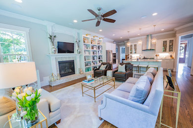 Example of a classic family room design in Raleigh