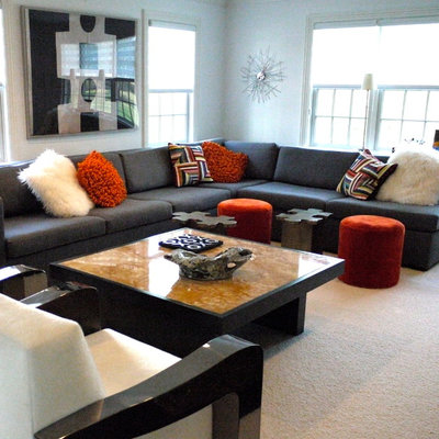 Family room - large modern enclosed family room idea in New York with white walls