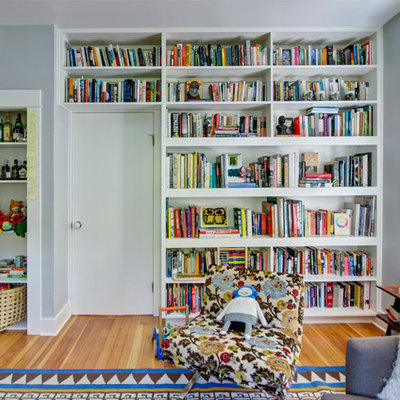 Example of a country family room design in Portland