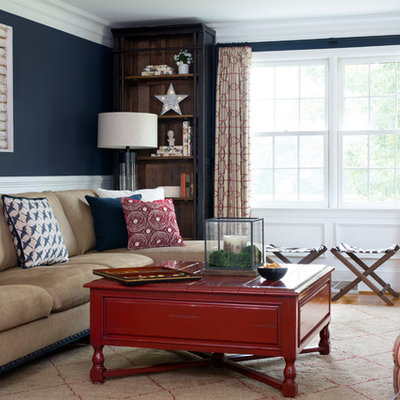 Family room library - mid-sized farmhouse enclosed medium tone wood floor family room library idea in DC Metro with blue walls, no fireplace and no tv