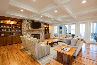 Example of a farmhouse family room design in Charlotte