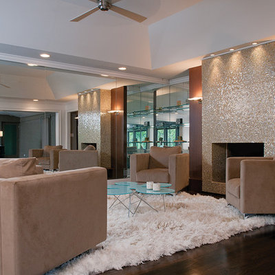 Family room - contemporary dark wood floor family room idea in Atlanta with a standard fireplace and a tile fireplace