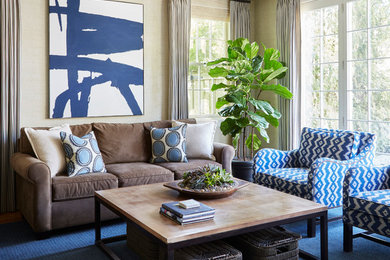 Example of a large transitional enclosed carpeted and blue floor family room design in Chicago with beige walls, no fireplace and no tv