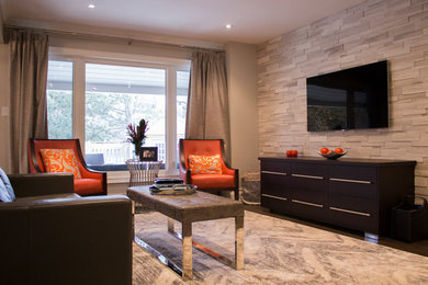 Inspiration for a transitional open concept dark wood floor family room remodel in Toronto with gray walls, a wall-mounted tv, a standard fireplace and a stone fireplace