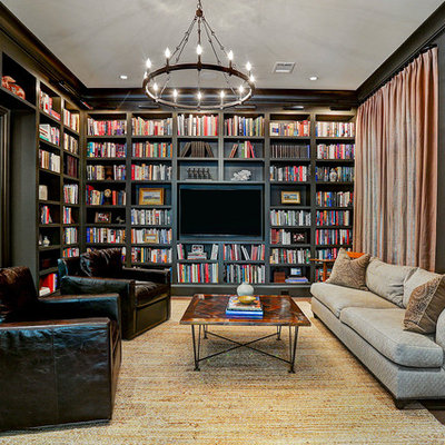 Inspiration for a transitional enclosed dark wood floor and brown floor family room library remodel in Houston with brown walls, no fireplace and a wall-mounted tv