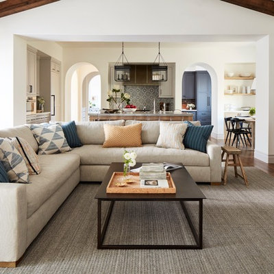 Family room - transitional open concept dark wood floor and brown floor family room idea in San Francisco with white walls