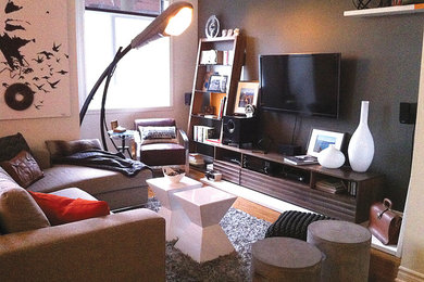 Example of a trendy family room design in Montreal