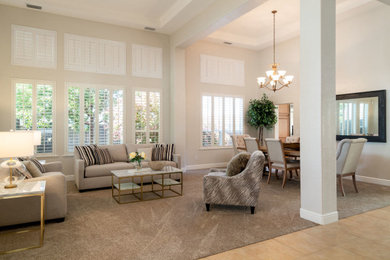 Mid-sized transitional open concept carpeted and beige floor family room photo in Sacramento with beige walls, no fireplace and no tv