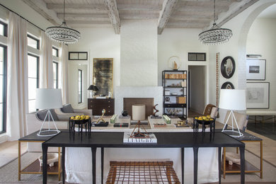 Example of a huge eclectic open concept light wood floor and brown floor family room design in Other with white walls, a standard fireplace and a brick fireplace