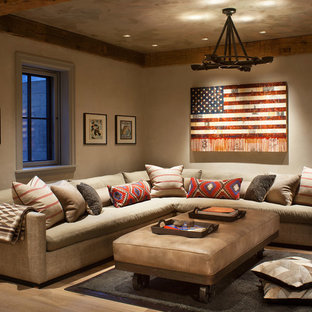 Family room - rustic medium tone wood floor family room idea in New York with beige walls
