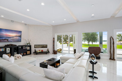 Example of a transitional family room design in Orlando