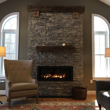 Nantucket Stacked Stone and Reclaimed Oak Timber Fireplace