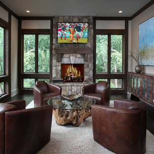 Mountain style dark wood floor family room photo in Atlanta with a standard fireplace and a stone fireplace