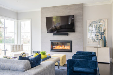 Large transitional open concept dark wood floor and brown floor family room photo in Boston with gray walls, a ribbon fireplace, a tile fireplace and a wall-mounted tv