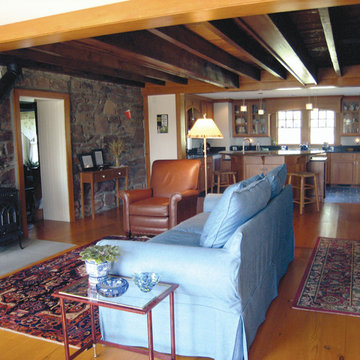 New Family Room and Kitchen with original stone wall and beams