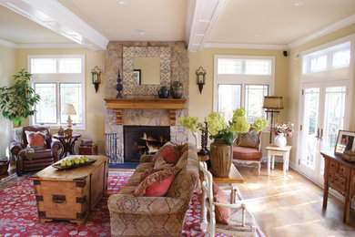 Mid-sized transitional light wood floor family room photo in New York with beige walls and no fireplace
