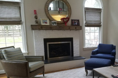 Large trendy open concept family room photo in Philadelphia with a standard fireplace and a brick fireplace