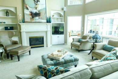 Example of a mid-sized transitional open concept carpeted and beige floor family room design in Minneapolis with beige walls, a standard fireplace, a stone fireplace and a media wall