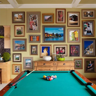 Example of a mid-sized classic open concept carpeted and beige floor game room design in Portland with green walls, no fireplace and no tv