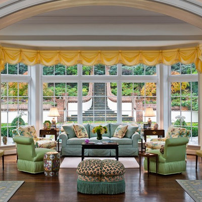 Inspiration for a timeless dark wood floor family room remodel in Philadelphia with beige walls