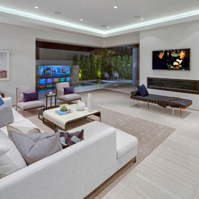 Example of a large trendy open concept porcelain tile family room design in Los Angeles with a ribbon fireplace, white walls, a plaster fireplace and a wall-mounted tv