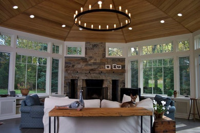 Inspiration for a mid-sized craftsman open concept family room remodel in New York with white walls, a standard fireplace, a stone fireplace and no tv