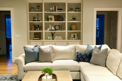 Example of a transitional family room design in New York