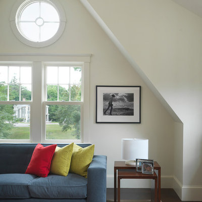 Inspiration for a timeless dark wood floor family room remodel in Boston with white walls