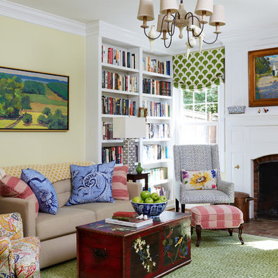 Inspiration for a country enclosed brick floor and brown floor family room remodel in DC Metro with a standard fireplace, no tv, yellow walls and a brick fireplace
