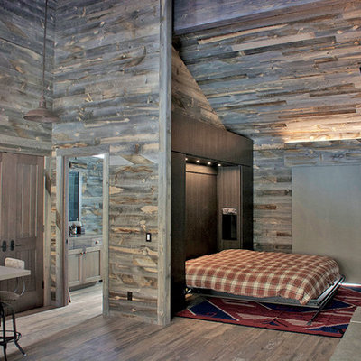Inspiration for a mid-sized rustic open concept brown floor family room remodel in Denver with gray walls, a standard fireplace, a stone fireplace and a wall-mounted tv