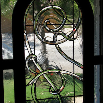 Operable oval wood & art-glass window