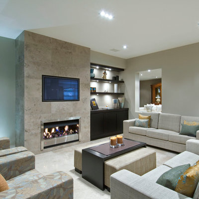 Family room - contemporary family room idea in Auckland with a tile fireplace