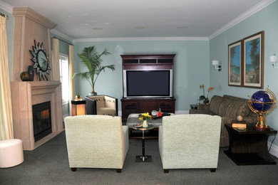 Photo of a contemporary mezzanine games room in Toronto with blue walls, carpet, a standard fireplace, a tiled fireplace surround and a concealed tv.