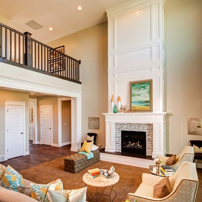 Example of a classic family room design in Salt Lake City with beige walls and a tile fireplace