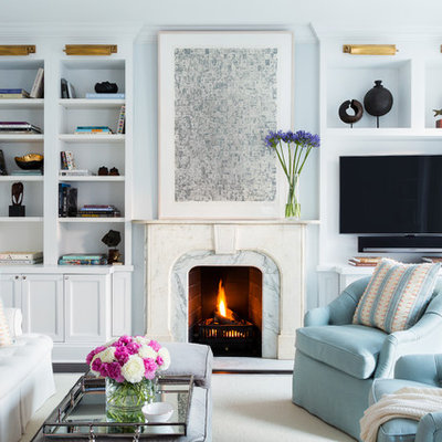 Family room - large transitional open concept carpeted family room idea in New York with a standard fireplace, a stone fireplace, a media wall and blue walls